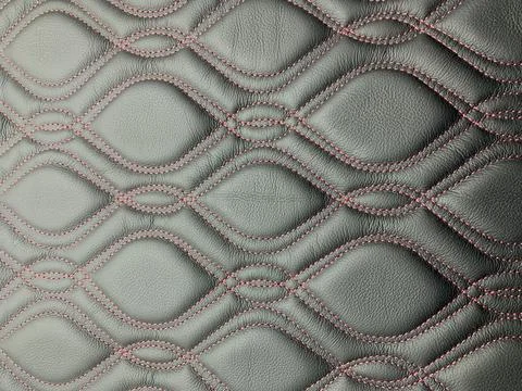 Material leather texture. Thread pattern on the black leather. 스톡 사진