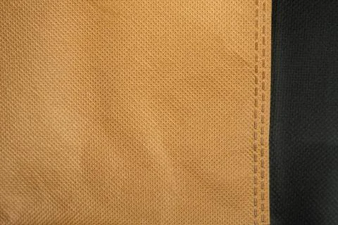 Material of light brown polyamide tissue bag with copyspace, close up. Foto stock