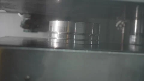 Material processing continues in industrial molding machine Stock Footage 324074959