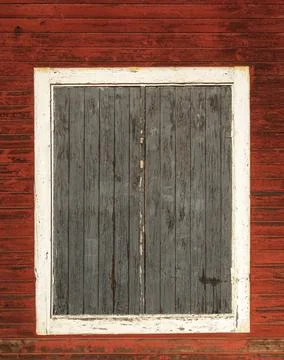 Material texture of boarded windows with weathered wood boards with peeling r Stock Photos