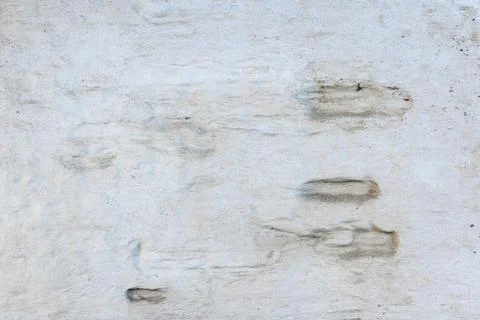 Material texture of damaged and cracked plaster wall, surface background. Stock Photos