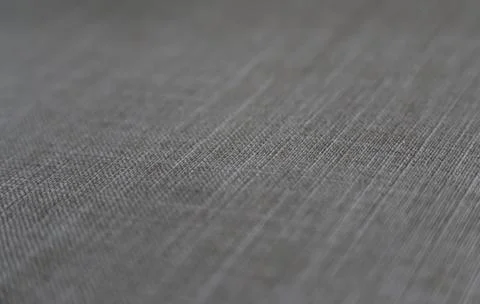 Material texture, with depth of field - Beige colour with light vignette. Stock Photos