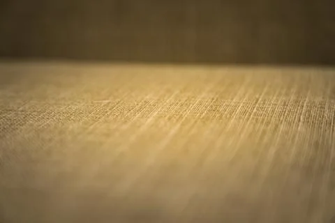 Material texture, with depth of field - Beige colour with light vignette. Stock Photos