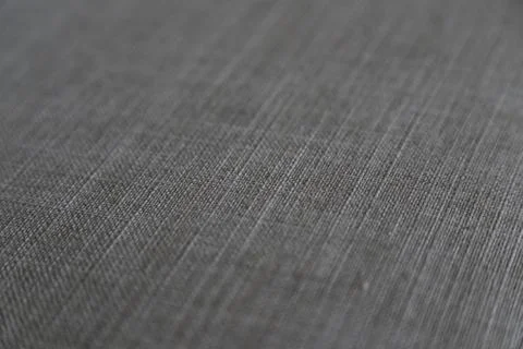 Material texture, with depth of field - Beige colour with light vignette. Stock Photos