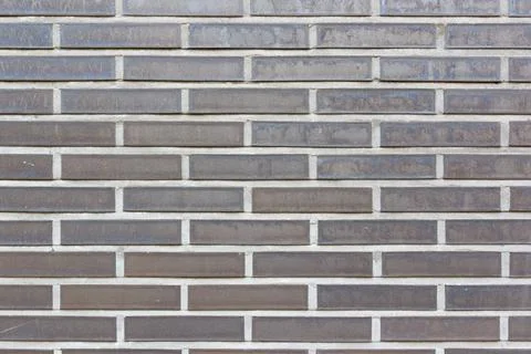 Material texture of gray brick wall Stock Photos