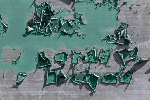 Material texture of green peeling paint on metal Stock Photos