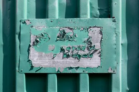 Material texture of green peeling paint on metal Stock Photos