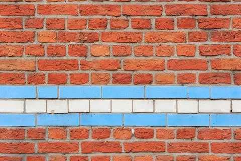 Material texture of red brick wall with blue and white lines Stock Photos
