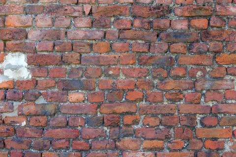 Material texture of red brick wall Stock Photos