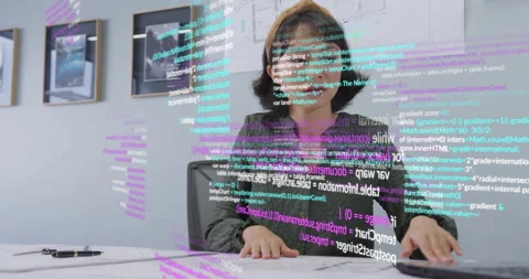 Materializing holographic panels, developer tapping desk and swiping code for Stock Footage 315537795