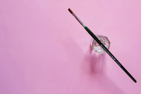 Materials for coloring of eyebrows on a pink background Фото