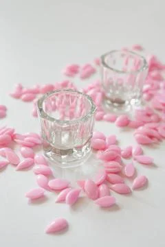 Materials for depilation of eyebrows and delicate areas. Pink wax granules Stock Photos