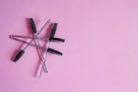 Materials for eyebrows on a pink background Stock Photos