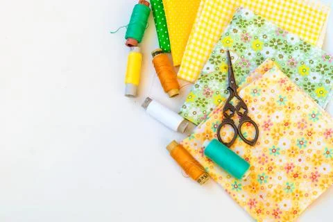 Materials at hand sewing on white Photos