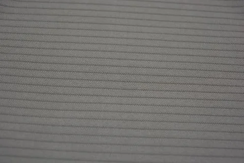 Materials, light green, brown thin fabric with texture and small lines. Stock Photos