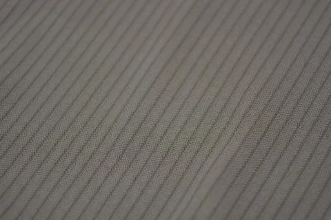 Materials, light green, brown thin fabric with texture and small lines. Stock Photos