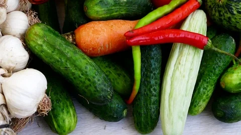 Materials required for winter pickle. gherkin,pepper,garlic, carrot,vinegar. Stock Footage 101351492