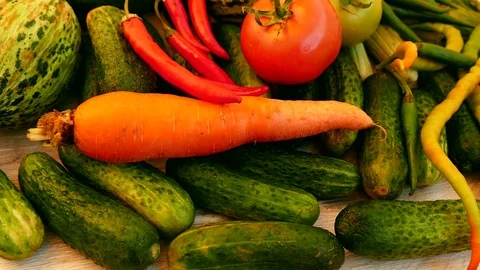 Materials required for winter pickle. gherkin,pepper,garlic, carrot,vinegar. Stock Footage 101351708