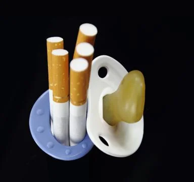 Maternity and cigarette Stock Photos