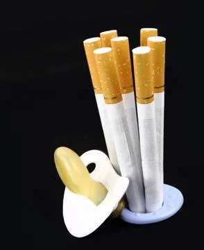 Maternity and cigarette Stock Photos