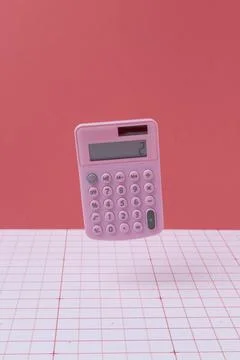 Math arrangement with calculator floating Stock Photos