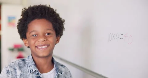 Math class, portrait of child at board for education, learning and problem Stock Footage 249250239