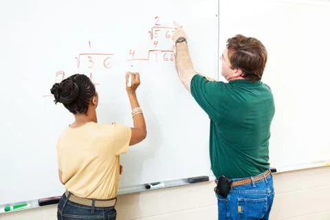 Math Class - Student and Teacher Stock Photos