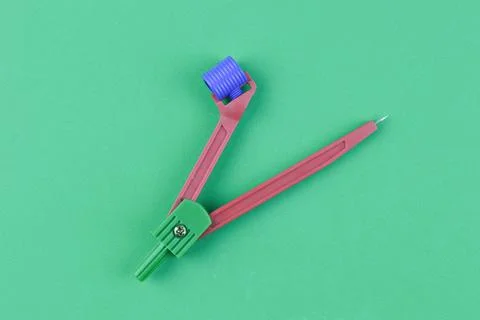 Math compass over green background Stock Photos