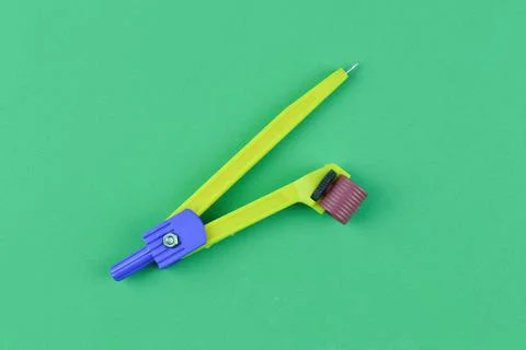 Math compass over green background Stock Photos