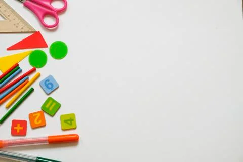 Math concept: colorful pens and pencils, number, calculating sticks in white Stock Photos