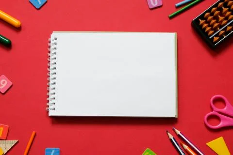 Math concept: colorful pens and pencils, number, calculating sticks in red Stock Photos
