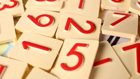 Math education arithmetic number toy blocks rotating pattern macro texture Stock Footage 91378813