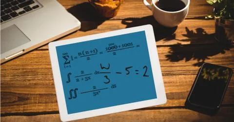 Math equation of tablet PC's screen at outdoor cafe Stock Photos