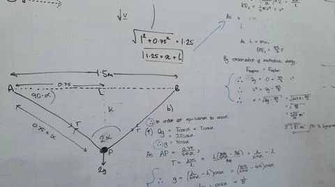 Math equations on a white board Stock Photos