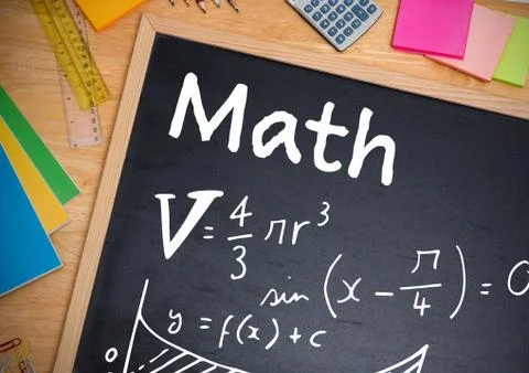 Math equations written on blackboard Stock Photos