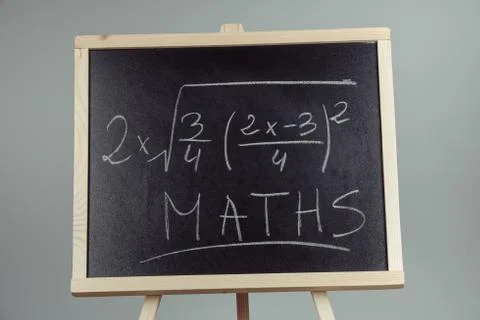 Math exercise on chalkboard Stock Photos