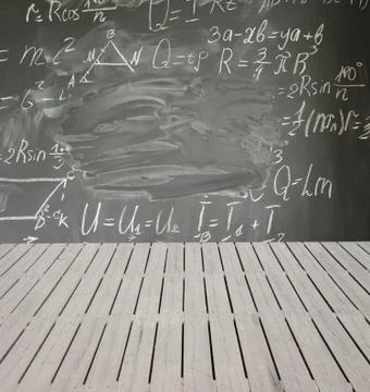 Math formulas on black board Stock Photos