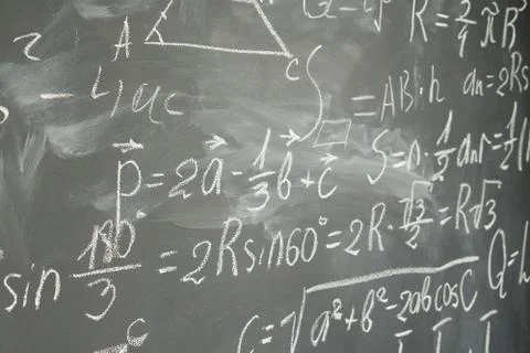 Math formulas on black board Stock Photos