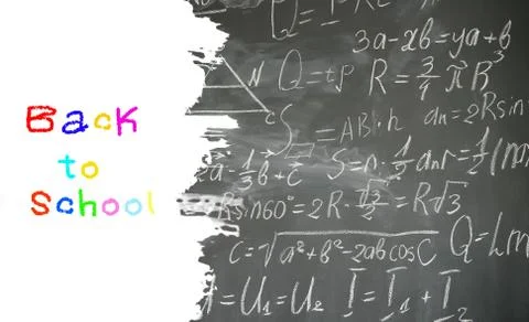 Math formulas on black board Foto stock
