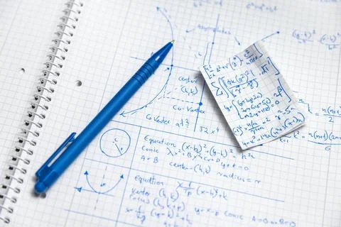 Math handwriting in notebook closeup Stock Photos