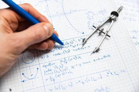 Math handwriting in notebook closeup Stock Photos