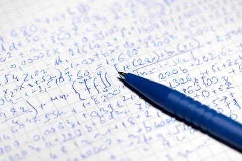 Math handwriting in notebook closeup Stock Photos