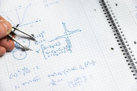 Math handwriting in notebook closeup Stock Photos