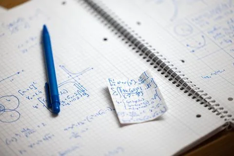 Math handwriting in notebook closeup Stock Photos