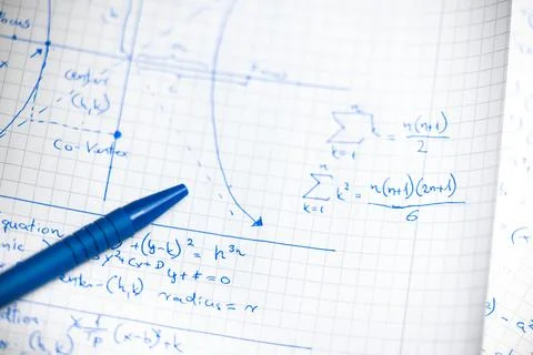 Math handwriting in notebook closeup Stock Photos