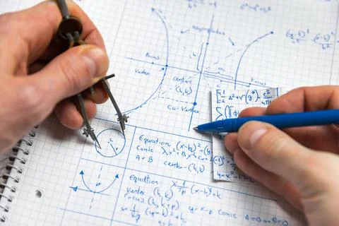 Math handwriting in notebook closeup Stock Photos
