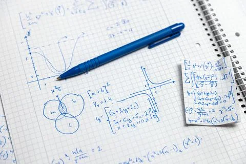 Math handwriting in notebook closeup Stock Photos