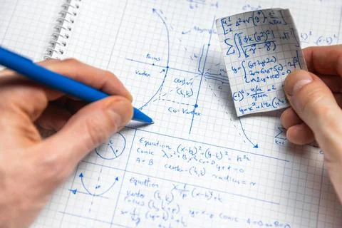 Math handwriting in notebook closeup Stock Photos