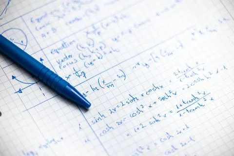 Math handwriting in notebook closeup Stock Photos