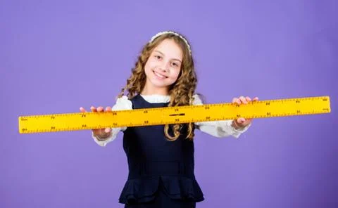 Math lesson. Education and knowledge. STEM school disciplines. Pupil girl with Stock Photos